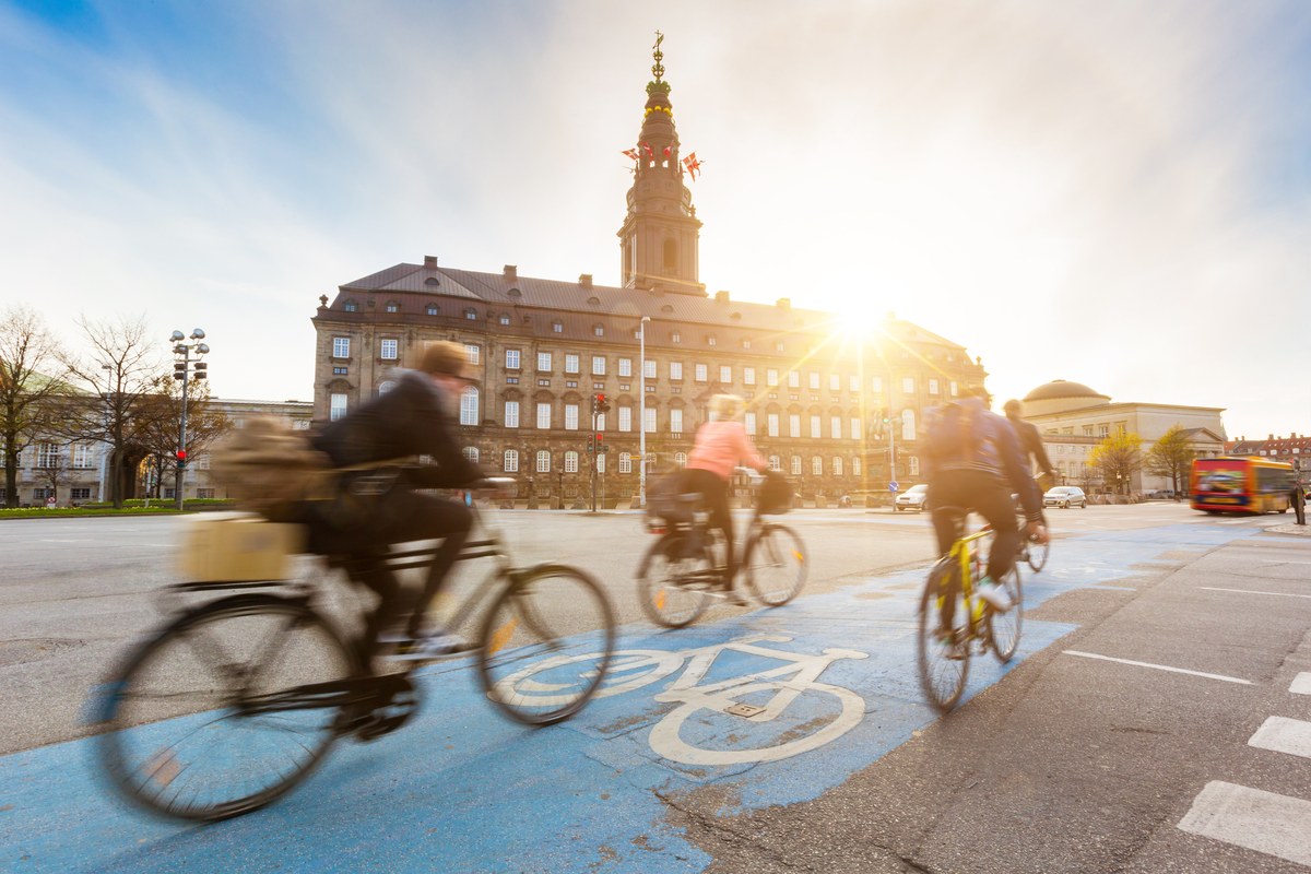Cyclists in front of Christiansborg in Copenhagen