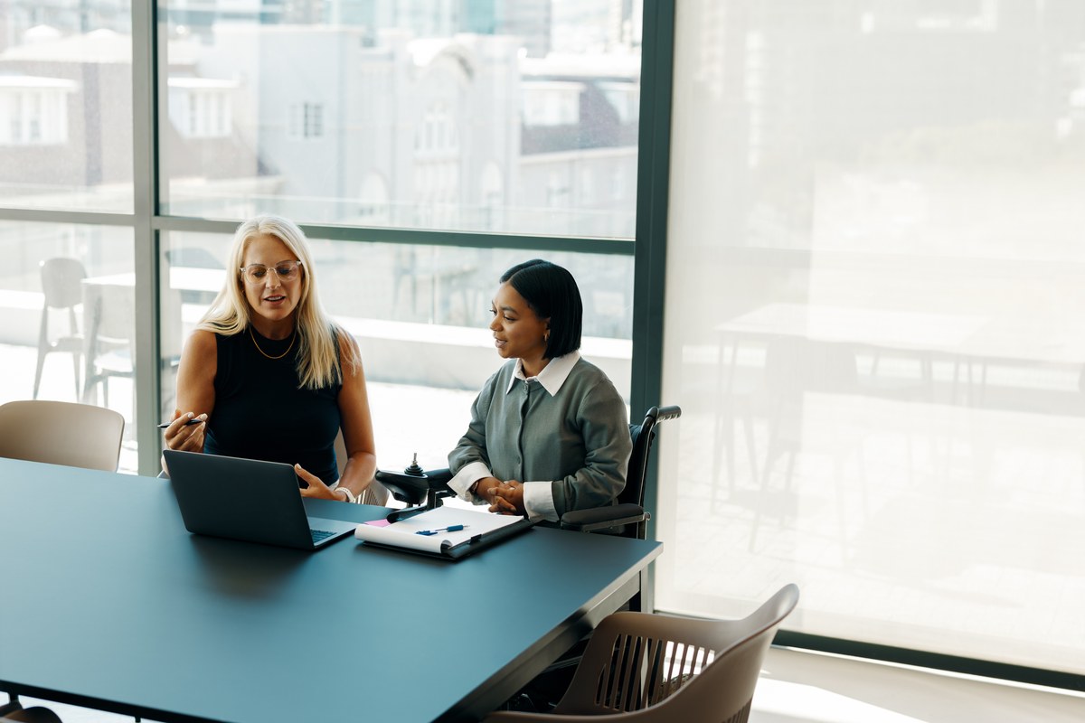Two women in a meeting in a modern office