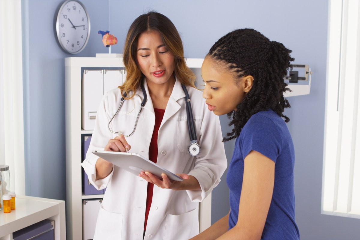 Doctor talking with a patient